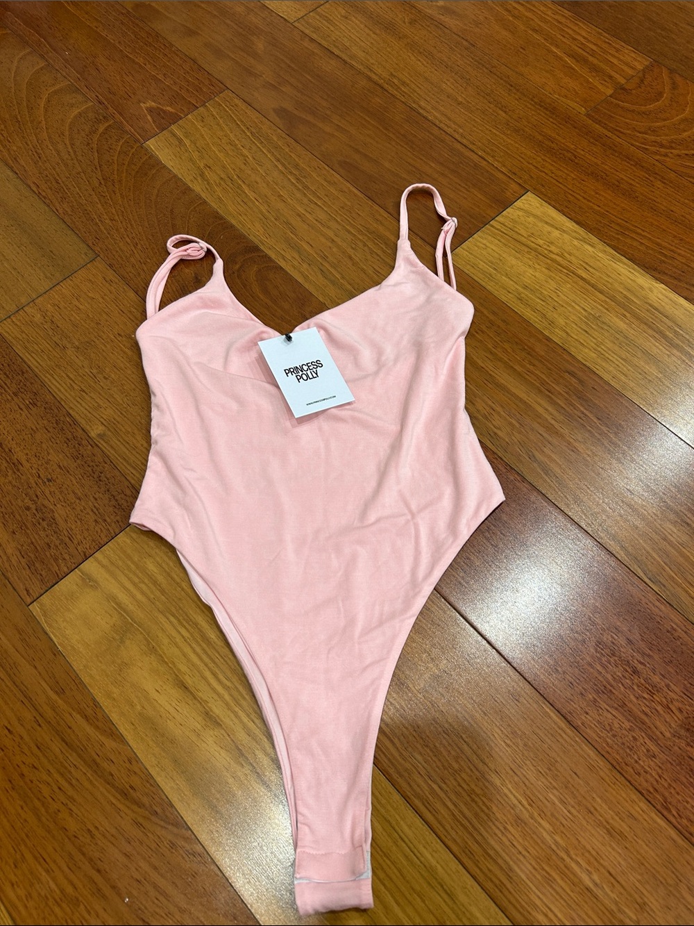 Ladies size 4 new with tags princess Polly pink bodysuit